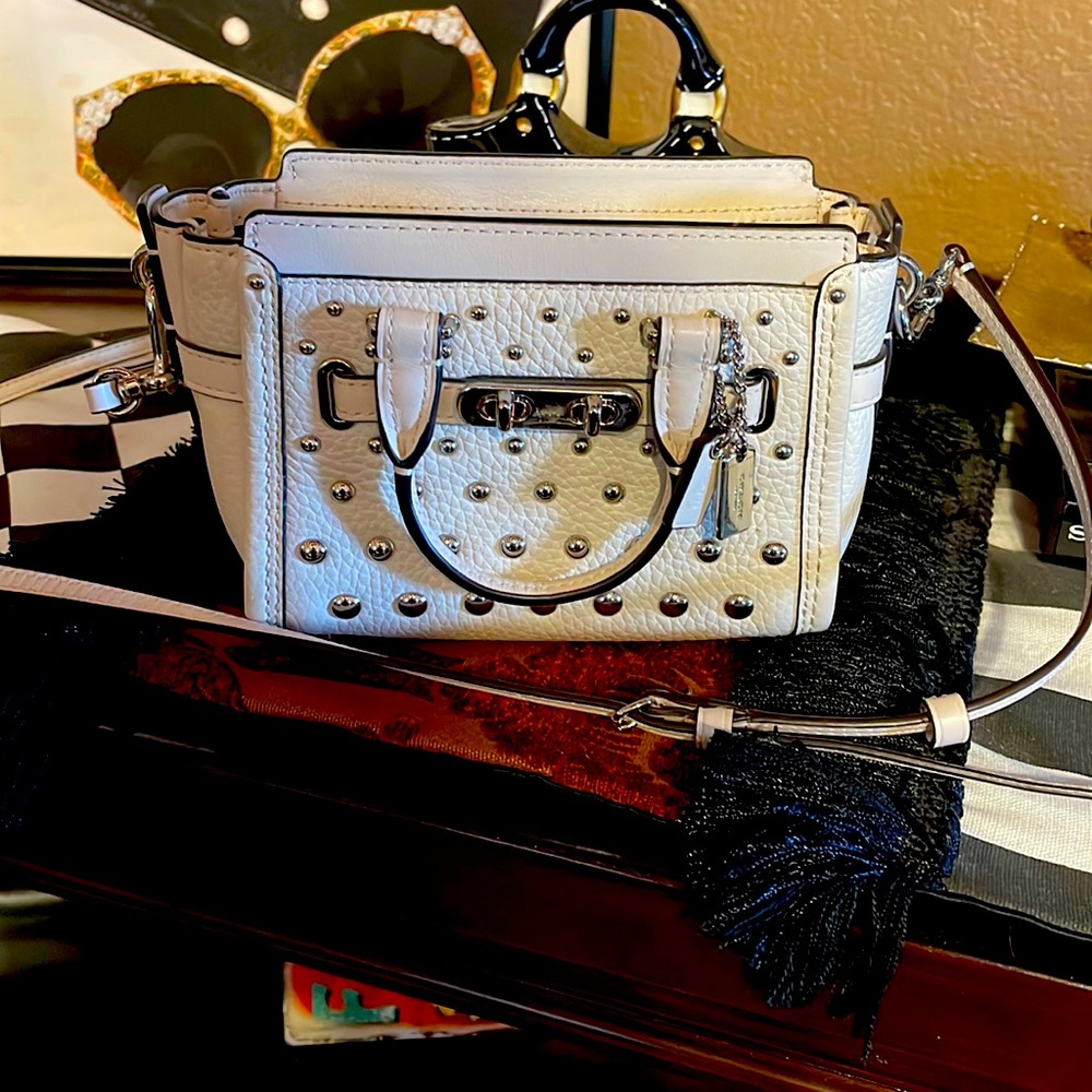 Adorable crossbody coach purse , X small size ! Good for a night out !